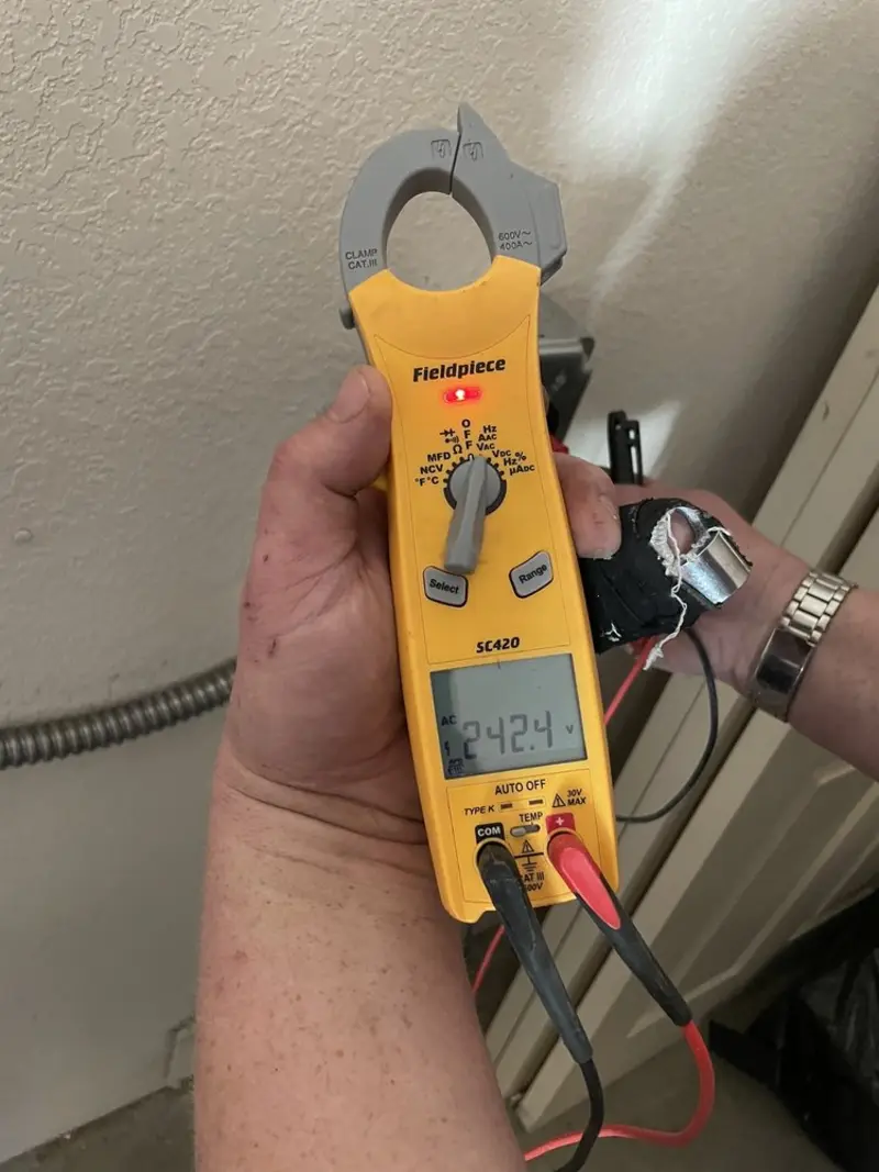 Voltage testing with clamp meter during Generator Installation in Goodyear